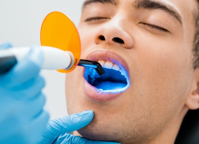 Patient receiving cosmetic dental bonding