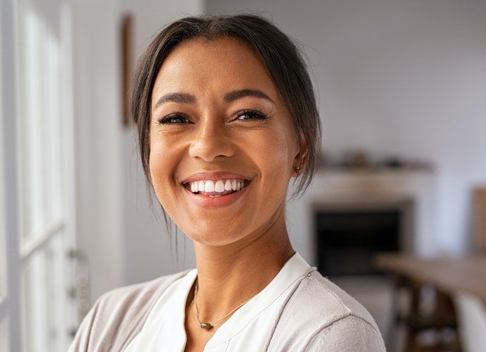 Woman sharing beautiful smile after gum recontouring